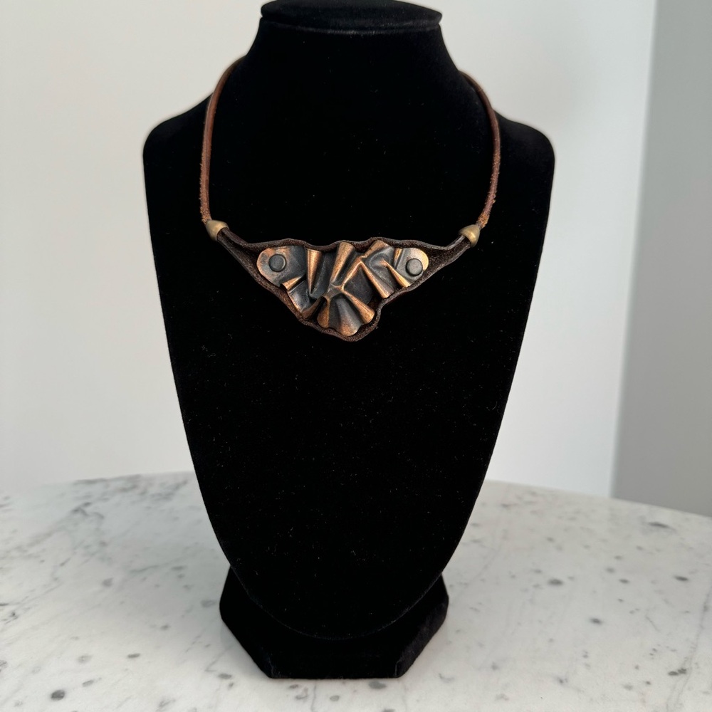 Handmade artisan choker made of leather and hammered copper